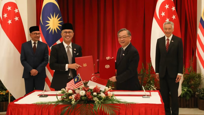 Singapore, Malaysia sign three cooperation agreements on digital economy, green economy ảnh 1