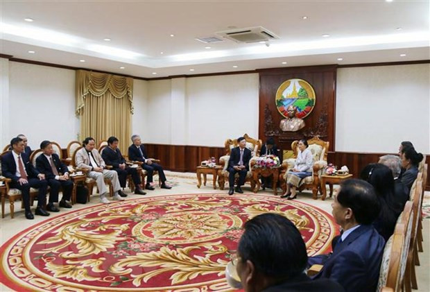 Vietnamese officials visit Laos to strengthen ties ảnh 1