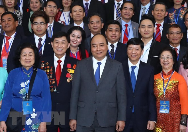 Prime Minister meets overseas Vietnamese joining Homeland Spring programme ảnh 1 Prime Minister meets overseas Vietnamese joining Homeland Spring programme ảnh 1