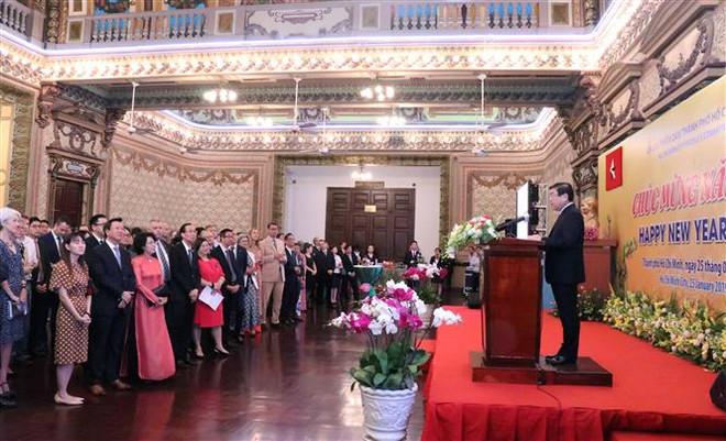 Tet gathering for foreign representative agencies in HCM City ảnh 1