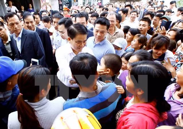 Criminal proceedings launched against illegal arrest of people in Hanoi ảnh 1