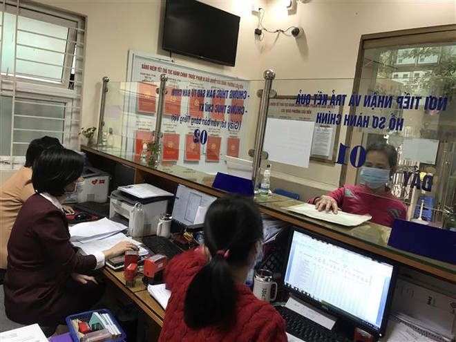 Hanoi workers return to work after Tet ảnh 1