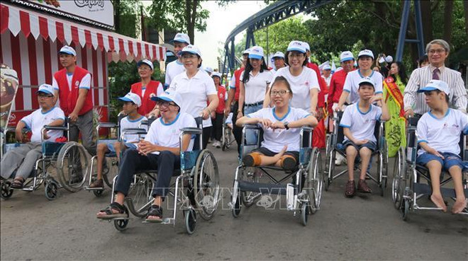 HCM City: Thousands walk for AO victims, people with disabilities ảnh 1 HCM City: Thousands walk for AO victims, people with disabilities ảnh 1