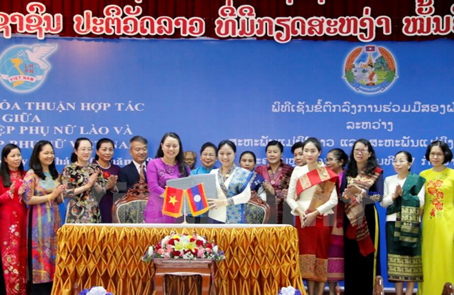 Women’s Unions of Vietnam, Laos seek to foster cooperation ảnh 1