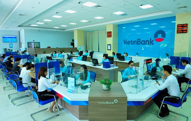 Clear of bad debts at VAMC, commercial banks report big profits ảnh 2