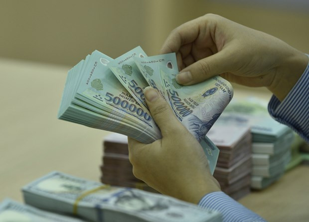 Clear of bad debts at VAMC, commercial banks report big profits ảnh 1