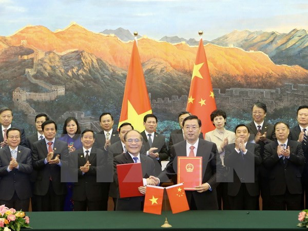 Vietnamese NA, China’s NPC sign cooperation agreement ảnh 1 Vietnamese NA, China’s NPC sign cooperation agreement ảnh 1