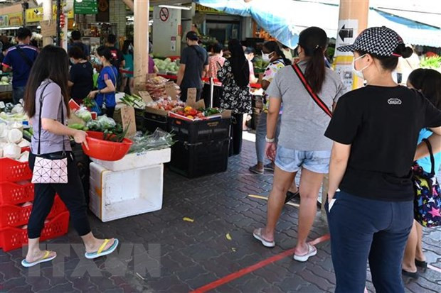 Singapore tightens border measures due to Omicron variant ảnh 1