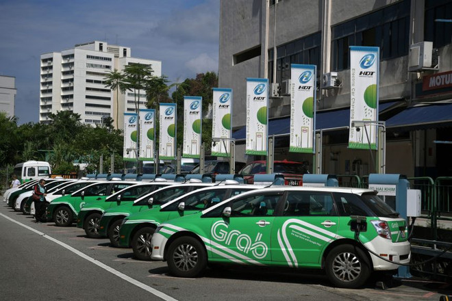 Grab to give commuters choice of electric or hybrid vehicles ảnh 1