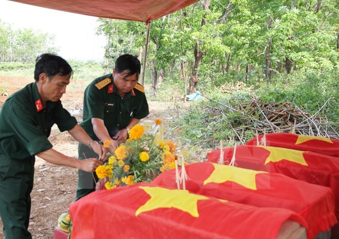 Quang Binh reburies Vietnamese martyrs’ remains found in Laos ảnh 1 Quang Binh reburies Vietnamese martyrs’ remains found in Laos ảnh 1