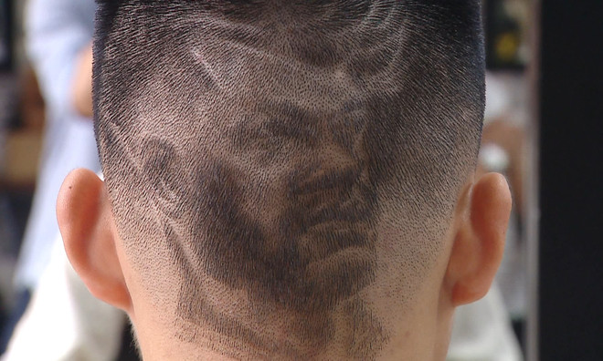 Fans enjoy World Cup with special haircuts ảnh 3