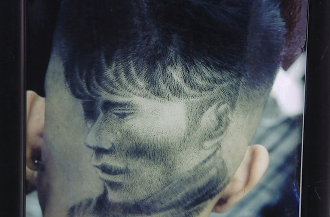 Fans enjoy World Cup with special haircuts ảnh 2