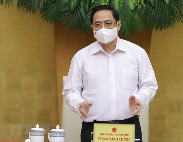 Prime Minister Pham Minh Chinh chairs first regular Government meeting ảnh 1
