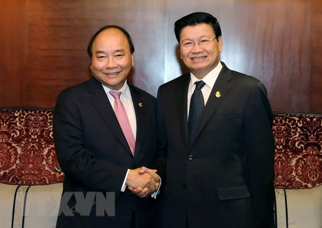 PM: Vietnam prioritises strengthening relations with Laos ảnh 1