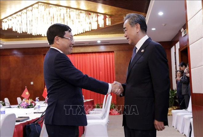 Deputy PM, FM meets with Chinese, Lao foreign ministers ảnh 2