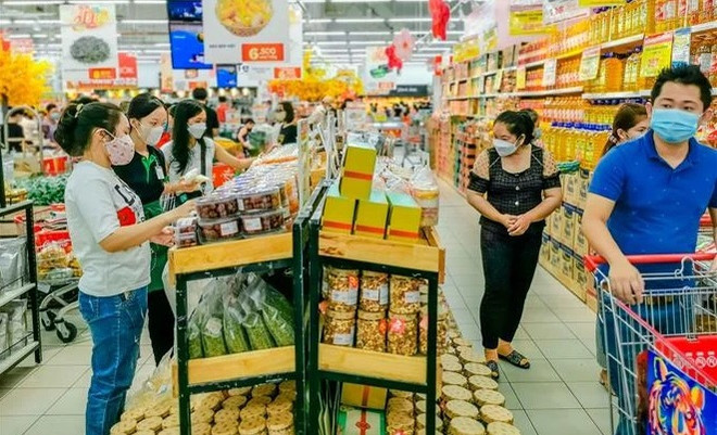 As Tet approaches, customers in mood to spend ảnh 1 As Tet approaches, customers in mood to spend ảnh 1