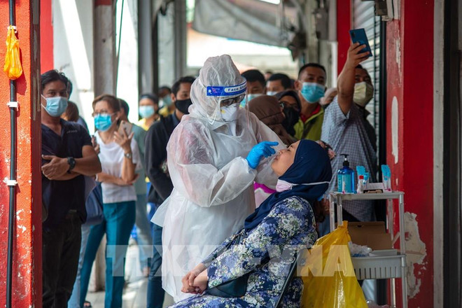 Malaysia needs 2.4 billion USD to overcome pandemic next year ảnh 1
