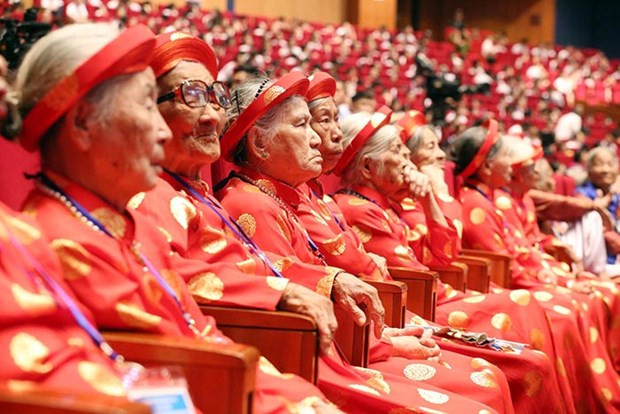 Political system, people join hands in caring for revolution contributors ảnh 2 Political system, people join hands in caring for revolution contributors ảnh 2