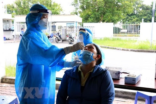 Vietnam sees drop of 5,373 COVID-19 cases on September 4 ảnh 1