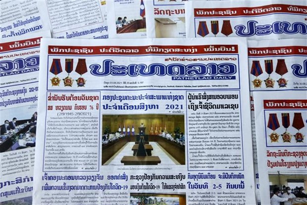 Lao newspaper hails Vietnam's achievements, Laos-Vietnam ties ảnh 1 Lao newspaper hails Vietnam's achievements, Laos-Vietnam ties ảnh 1