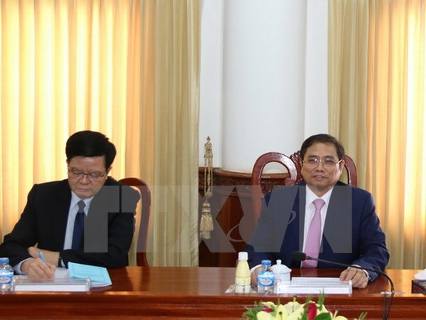 Vietnam, Laos Party organisation commissions enhance cooperation ảnh 1