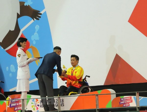 Swimmer secures first gold for Vietnam at Asian Para Games 2018 ảnh 1 Swimmer secures first gold for Vietnam at Asian Para Games 2018 ảnh 1