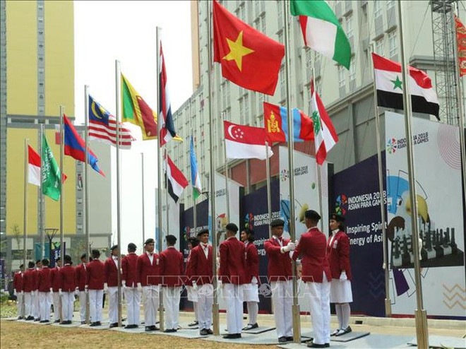 Vietnamese flag flies at 2018 Asian Para Games ảnh 1