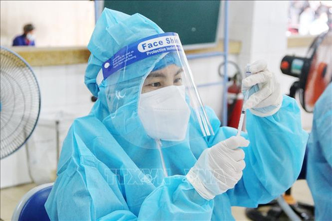 COVID-19: new cases on April 21 tops 12,000 ảnh 2