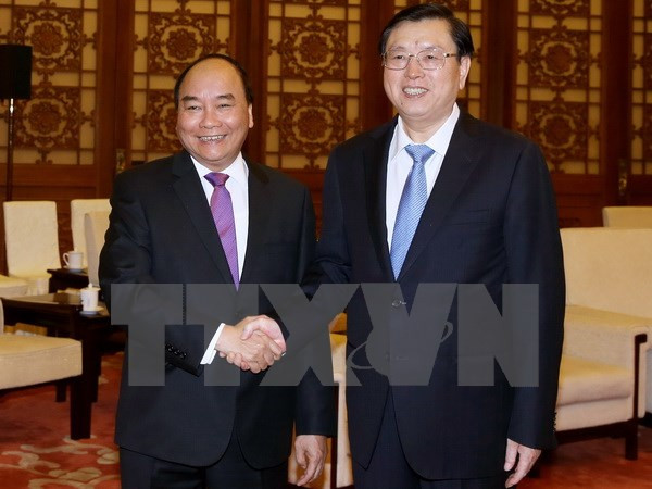 Prime Minister meets head of National People’s Congress of China ảnh 1 Prime Minister meets head of National People’s Congress of China ảnh 1