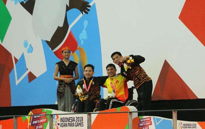 Swimmer Tung breaks another record at Asian Para Games ảnh 1 Swimmer Tung breaks another record at Asian Para Games ảnh 1