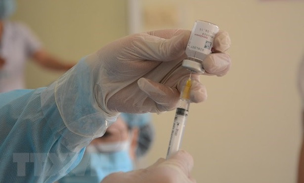 HCM City has no plans to inoculate children aged 12-17 against COVID-19 ảnh 1