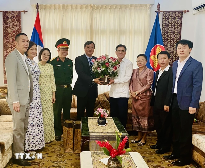 Vietnamese diplomats extend greetings to Lao Embassies in Belgium, Cuba on Bun Pi May festival ảnh 2 Vietnamese diplomats extend greetings to Lao Embassies in Belgium, Cuba on Bun Pi May festival ảnh 2