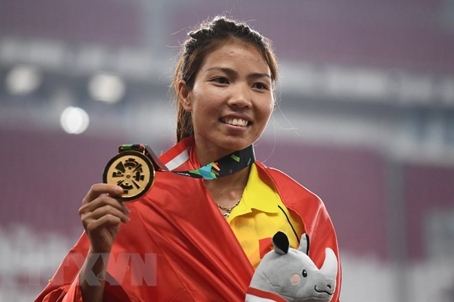 Vietnamese athlete rewarded after winning gold medal ảnh 1
