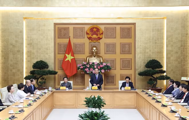 Government leader meets national brand enterprises ảnh 1