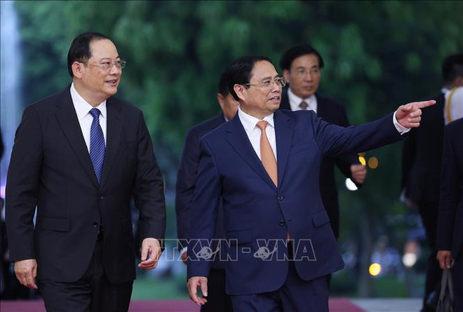 Vietnamese, Lao PMs join in working session in Hanoi ảnh 1 Vietnamese, Lao PMs join in working session in Hanoi ảnh 1
