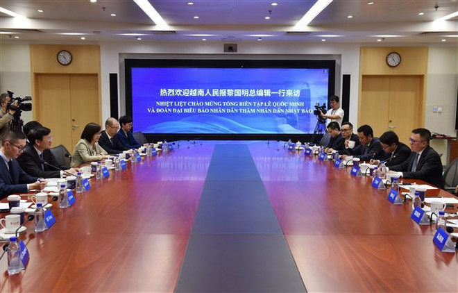 Nhan Dan Newspaper, People’s Daily of China enhance cooperation ảnh 2 Nhan Dan Newspaper, People’s Daily of China enhance cooperation ảnh 2