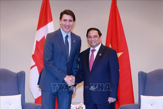 PM meets Canadian, Indian, Comoros leaders ảnh 2