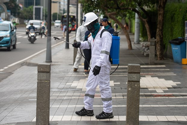 New COVID-19 cases rising in Southeast Asia, Singapore hardest-hit ảnh 1