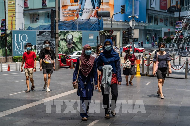 Malaysian economy projected to grow by 5.5-6.5 percent in 2022 ảnh 1