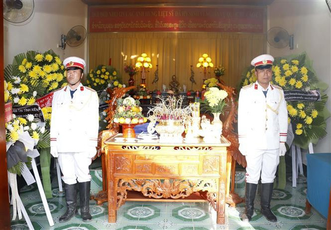 Remains of Vietnamese martyrs repatriated from Laos ảnh 2 Remains of Vietnamese martyrs repatriated from Laos ảnh 2