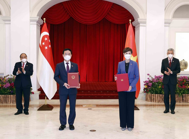 Visit lays foundation for Vietnam, Singapore to become role models for Southeast Asia: expert ảnh 1 Visit lays foundation for Vietnam, Singapore to become role models for Southeast Asia: expert ảnh 1