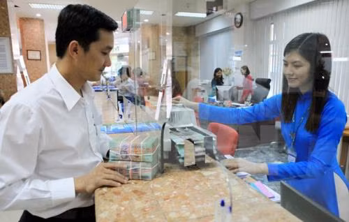 Reference exchange rate up 15 VND at week’s beginning ảnh 1