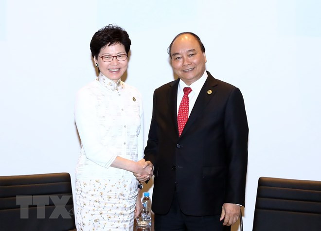 PM Phuc meets with New Zealand, Hong Kong leaders on APEC sidelines ảnh 1
