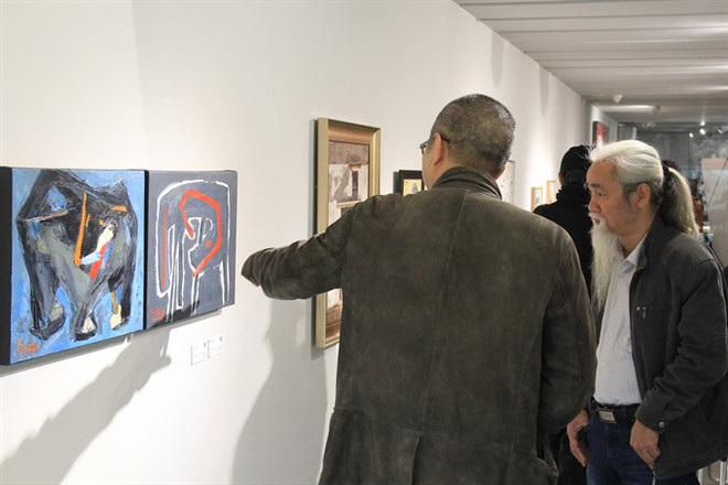 Hanoi: Dog paintings show celebrates Year of the Dog ảnh 1