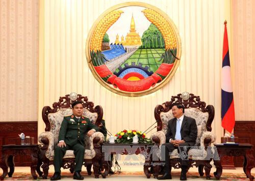 Lao PM urges closer coordination in searching fallen Vietnamese soldiers ảnh 1
