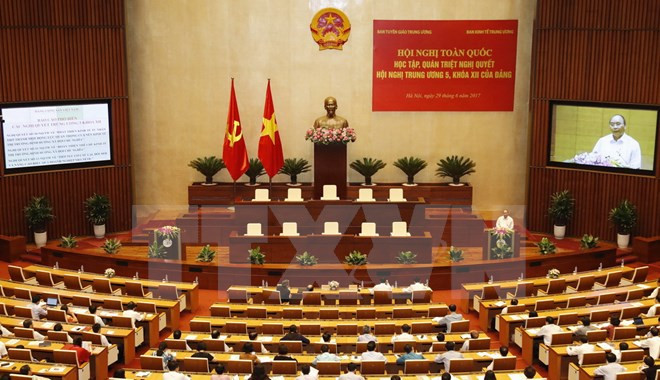 Conference focuses on Party’s economy-related resolutions ảnh 1