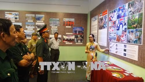 Exhibition showcases efforts to revive land polluted by UXO, chemicals ảnh 1