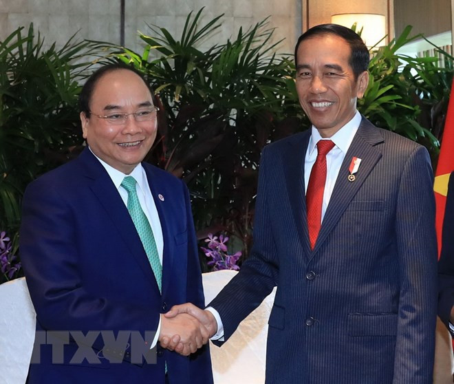PM Nguyen Xuan Phuc held bilateral meetings on sidelines of ASEAN Summit ảnh 1
