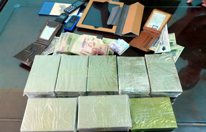 Death, life sentences imposed on heroin traffickers ảnh 1
