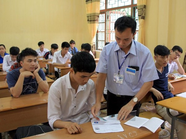900,000 students sit for national high school exam ảnh 1